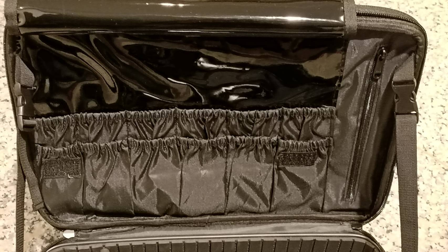 The very solid hard case for the vein viewing device has 12 pockets.